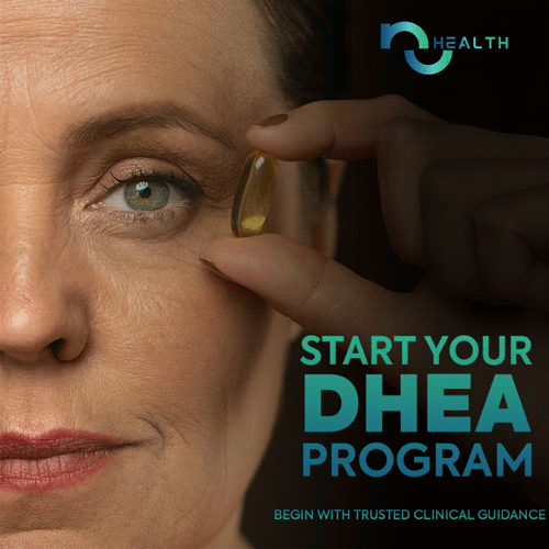 a woman holding a pill DHEA